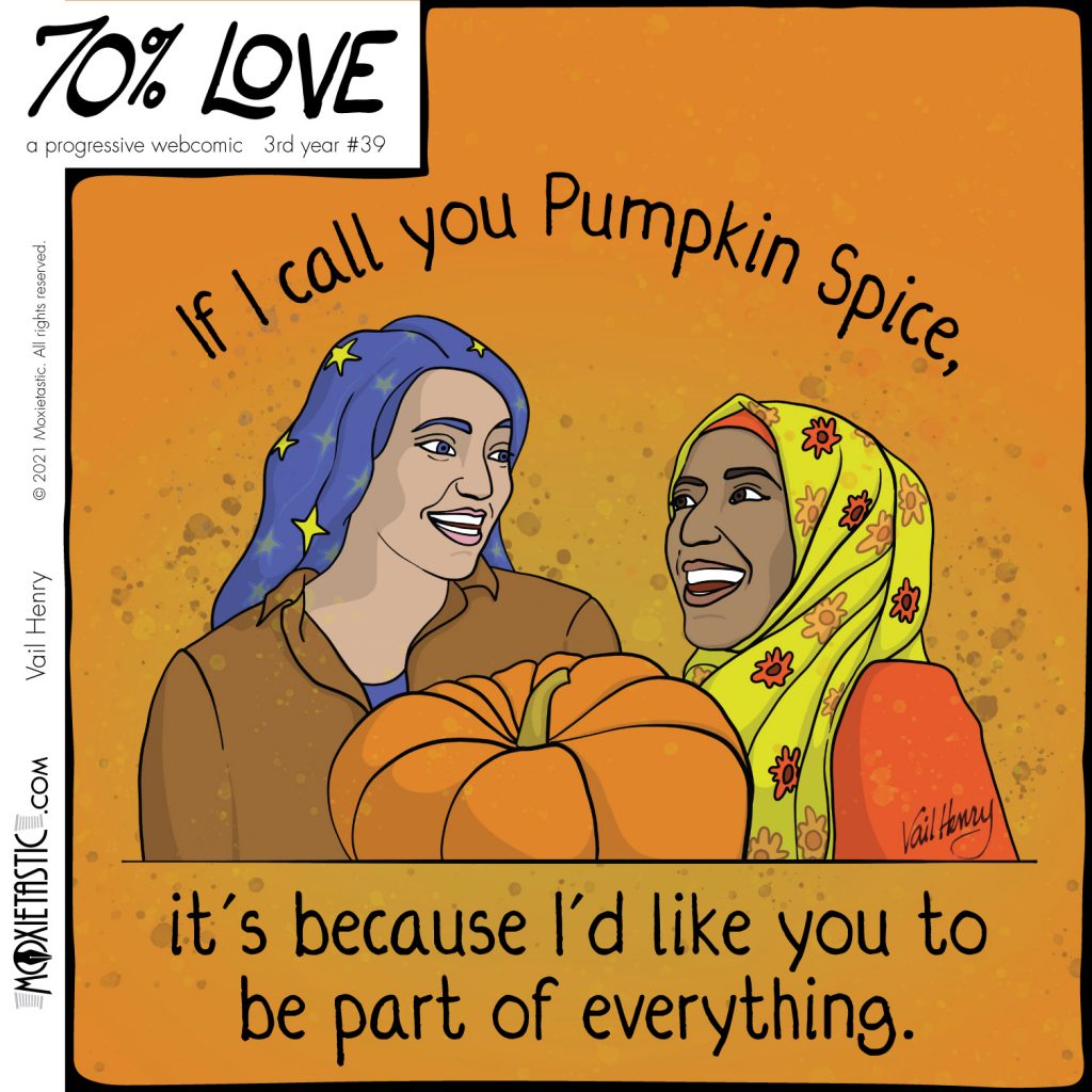 Two women smiling at each other, plus a pumpkin.